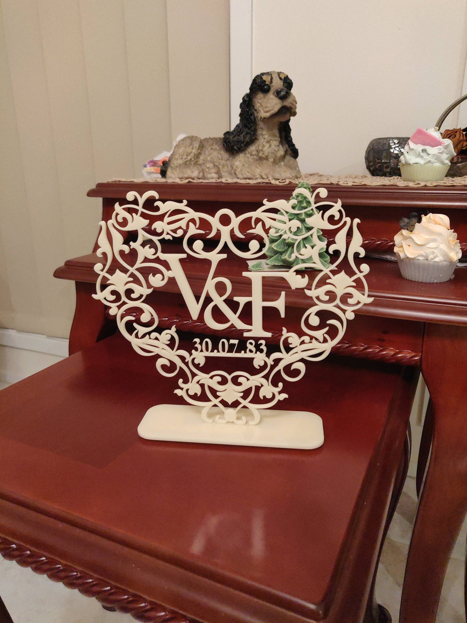 Acrylic heart with initials and date.