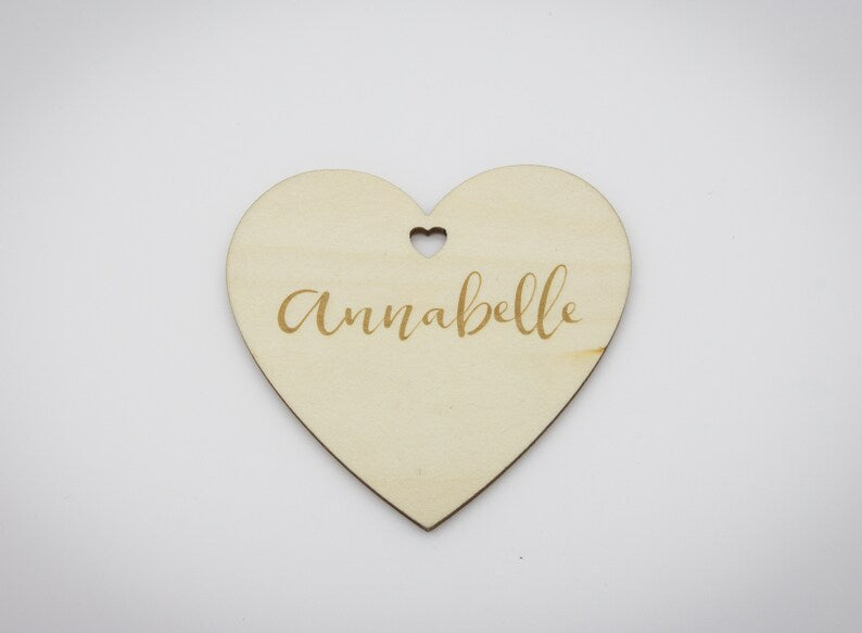 Engraved wooden heart tag.