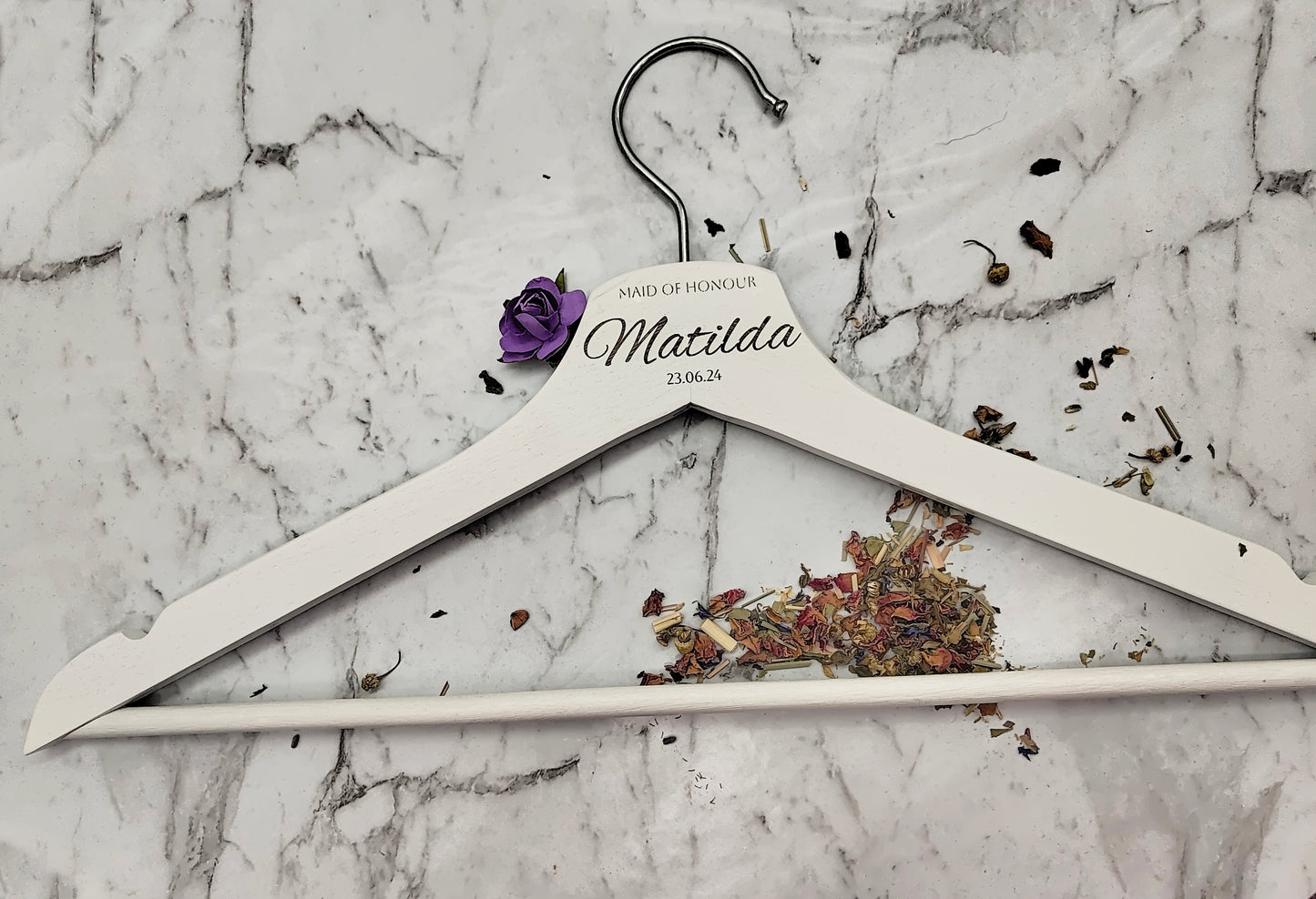 White wedding coat hanger.